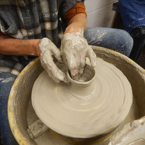 Pottery students at work